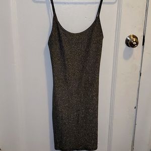 This is a sparkly mini dress, size S, color black.